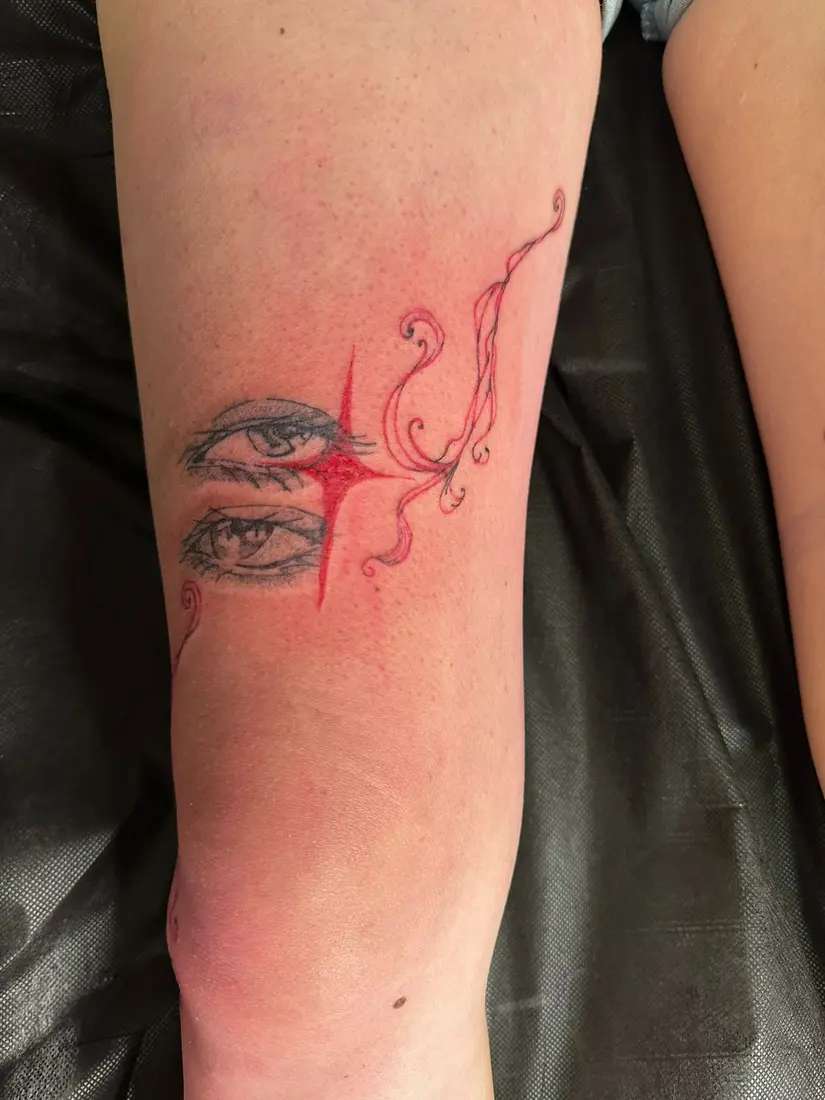 Manga Eyes with Red Accent Tattoo